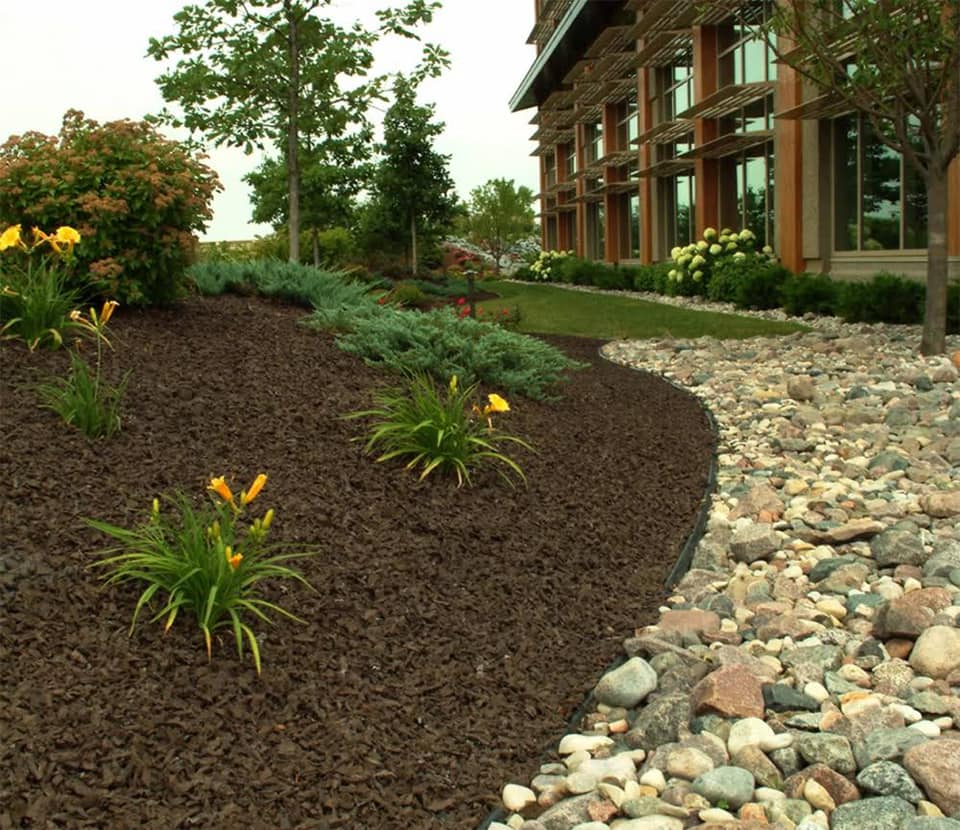 Finished outdoor area near pool and landscape features
