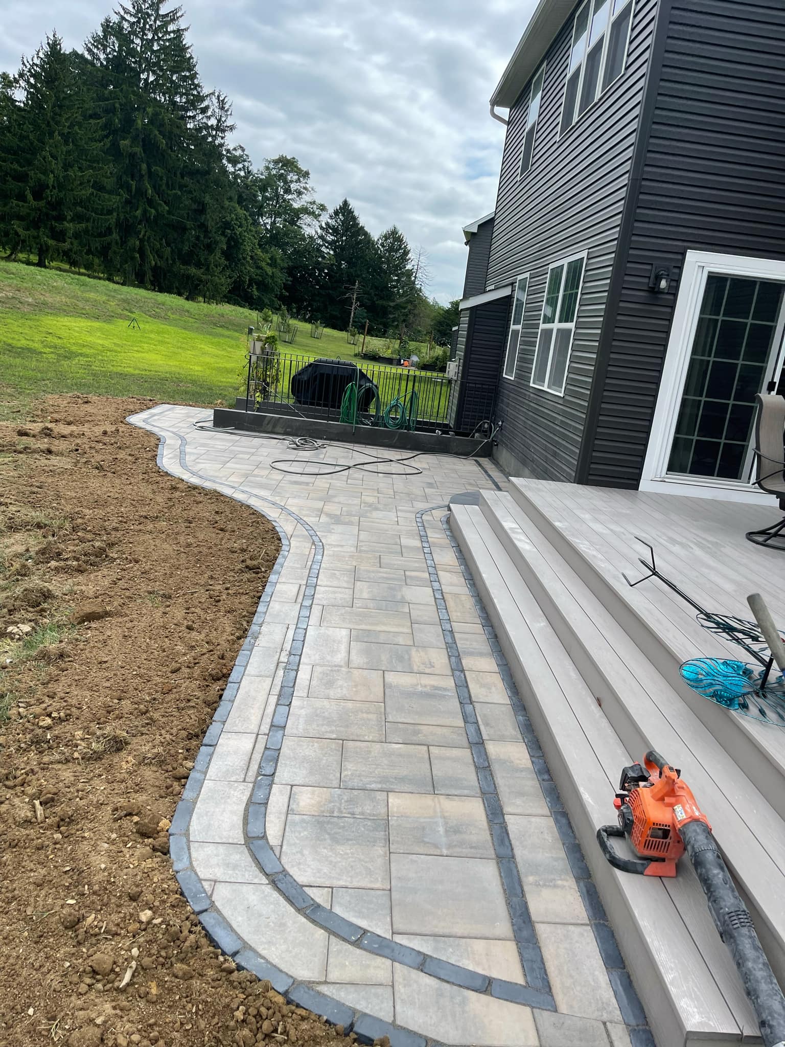 Outdoor hardscaping project detail by JM Outdoor Services